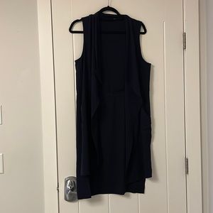 Navy blue. Cinched waist. Pocketed long vest. Size M